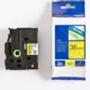 Brother TZe tape, 36mm x 8m, sort/gul