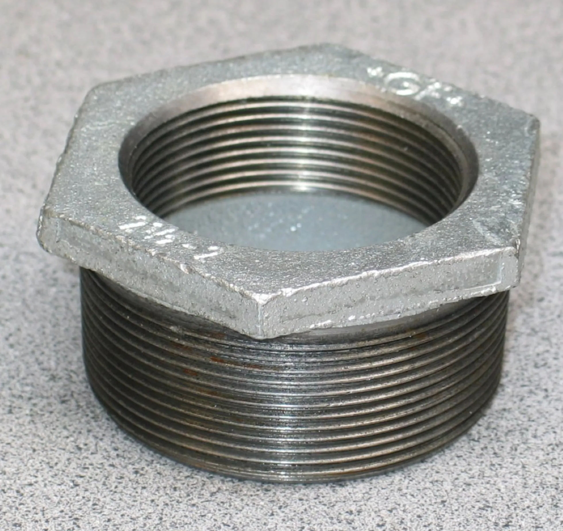 Galvaniseret nippelmuffe