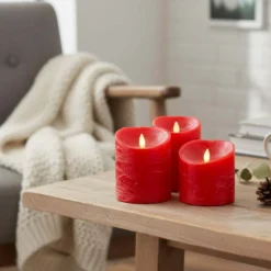 LED bloklys med bevægelig flamme, rød, 3 stk, Ø10cm, inkl. fjernbetjening og timer, højde varierende fra 10cm til 15cm, ægte stearin