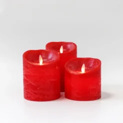 LED bloklys med bevægelig flamme, rød, 3 stk, Ø10cm, inkl. fjernbetjening og timer, højde varierende fra 10cm til 15cm, ægte stearin