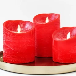 LED bloklys med bevægelig flamme, rød, 3 stk, Ø10cm, inkl. fjernbetjening og timer, højde varierende fra 10cm til 15cm, ægte stearin