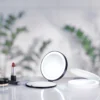 Make-up spejl med LED-lys, lomme model, genopladeligt batteri, 7x forstørrelse, sort, - Smedbo